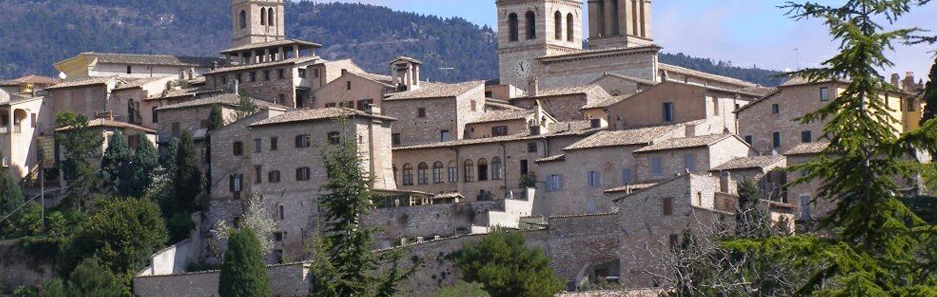 The skyline of Spello with its stone houses and bell towers